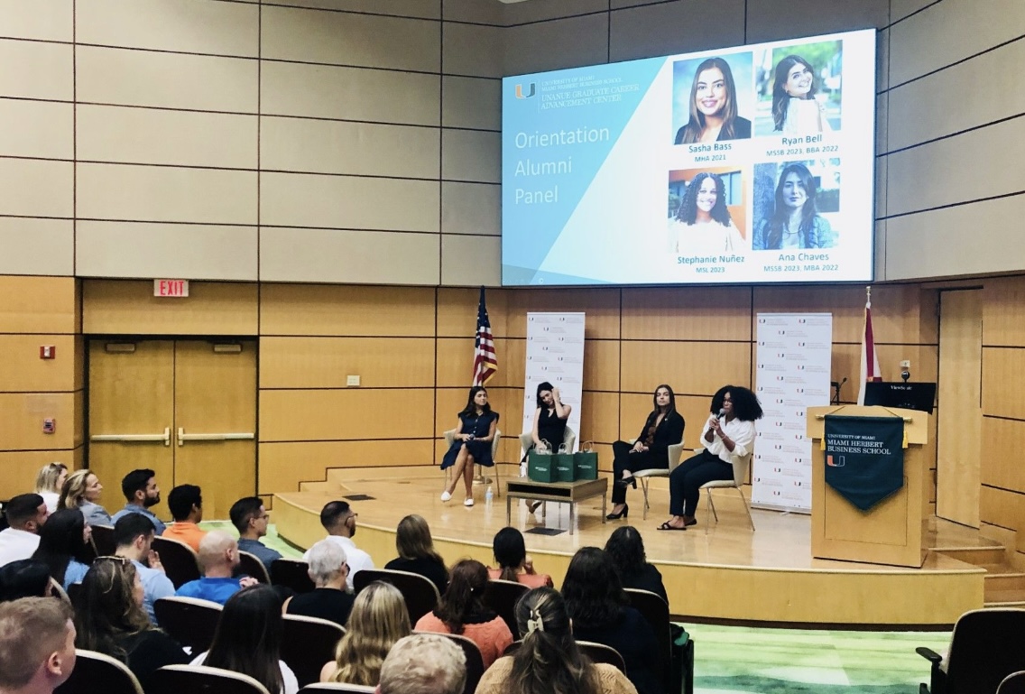 Ryan Bell speaking on a University of Miami Herbert Business School alumni panel